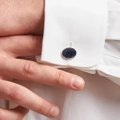 GEMELLI DA POLSO IN ARGENTO BLUCon microfantasia fiore