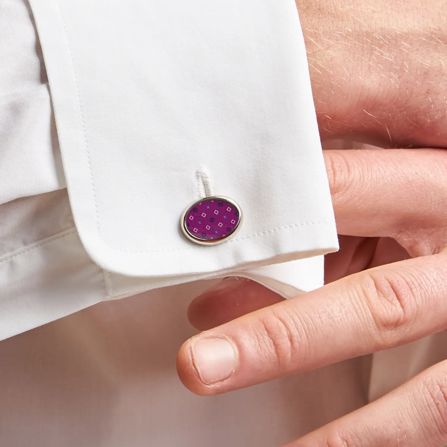 GEMELLI DA POLSO IN ARGENTO FUCSIA Con microfantasia fiore